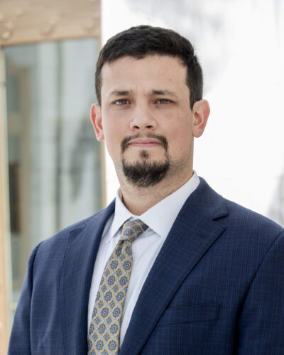 Jacob A. Machitar formal headshot in suit