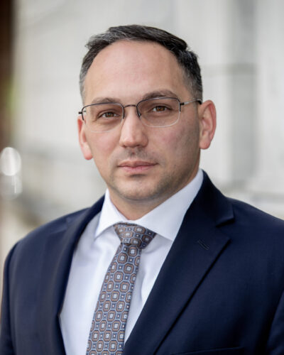 Xavier T. Romero formal headshot in suit