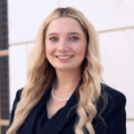 Isabella J. White formal headshot in suit