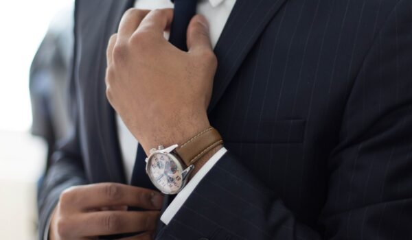 professional attorney dressed in a suit with watch