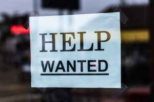 help wanted sign in a window employment