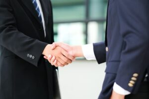 Mergers & Acquisitions Corporate Business Men Handshake