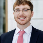 Fletcher K. Law formal headshot in a suit